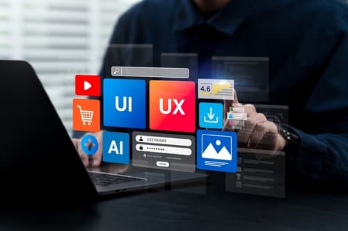 Designer working on UI/UX interface with colorful design elements including shopping cart, AI, and image icons