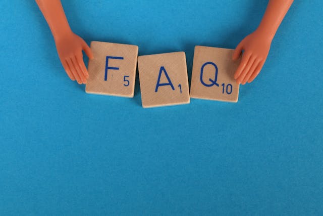 Frequently asked questions about B2B marketing and brand services spelled out in wooden tiles